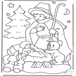 Coloriages Noël - Enfant en mangoire