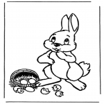 Coloriage thème - Lapin de Pâques avec des oeufs 1