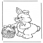 Coloriage thème - Lapin de Pâques avec des oeufs 2